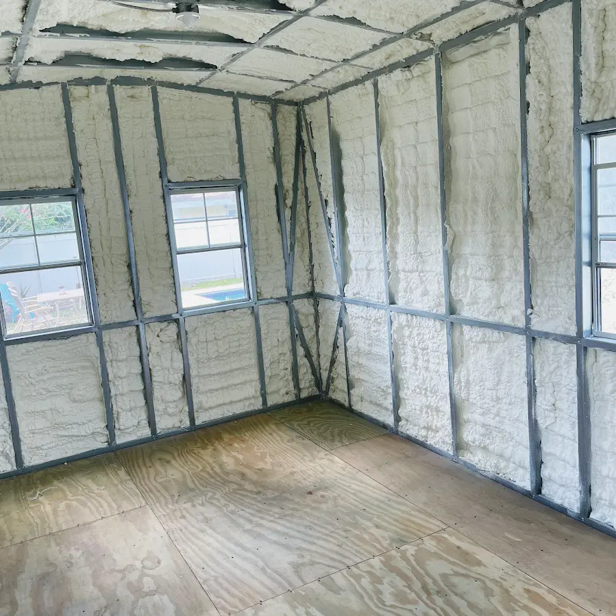 Closed-cell spray foam insulation applied to wall cavities in a residential project in Lower Merion